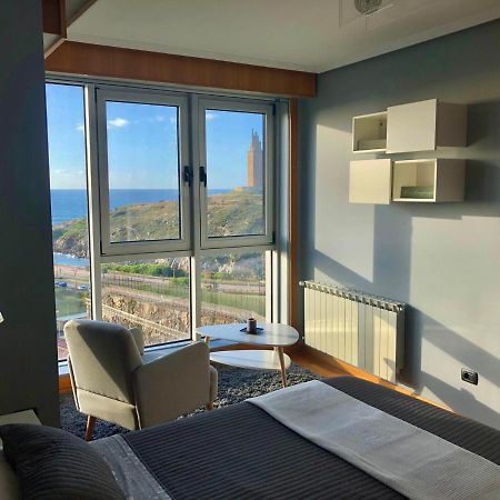 Parking, Vistas Al Mar Y Tres Habitaciones ア・コルーニャ エクステリア 写真