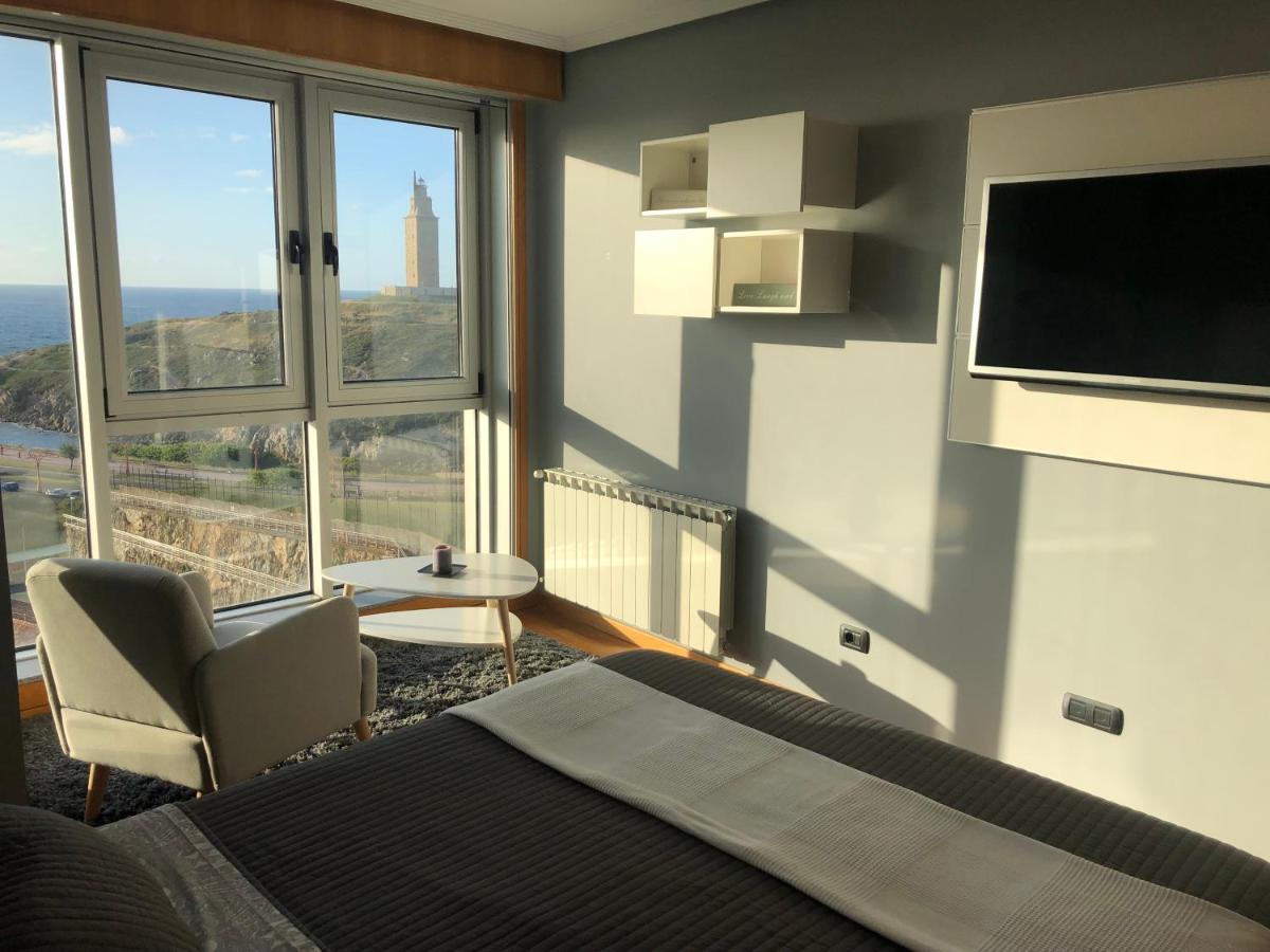 Parking, Vistas Al Mar Y Tres Habitaciones ア・コルーニャ エクステリア 写真