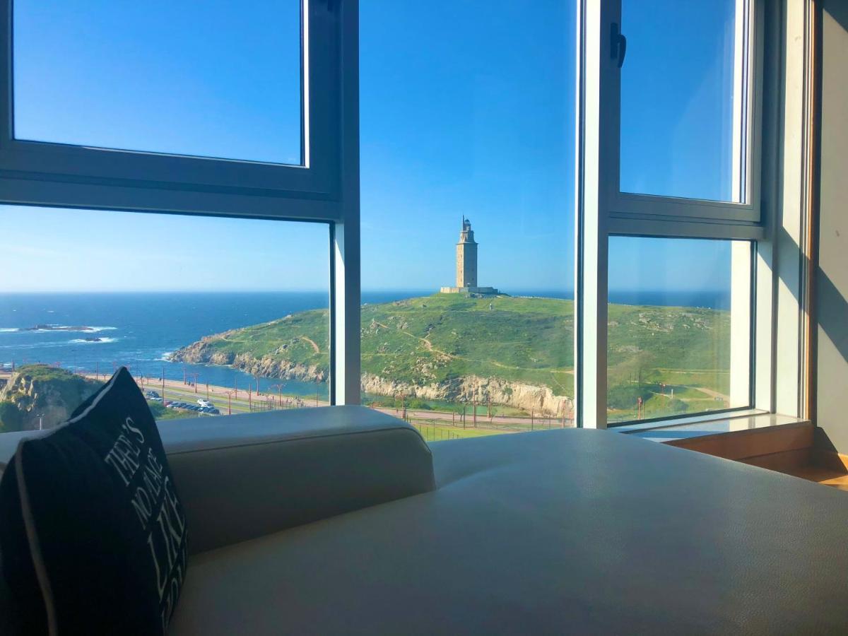 Parking, Vistas Al Mar Y Tres Habitaciones ア・コルーニャ エクステリア 写真