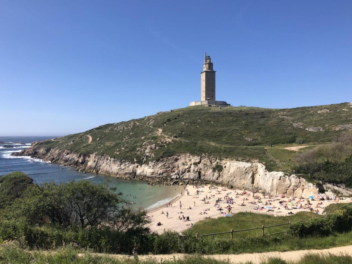 Parking, Vistas Al Mar Y Tres Habitaciones ア・コルーニャ エクステリア 写真